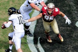 Bjoern Werner (95) reaches for Wake Forest QB Tanner Price on Sept. 15, 2012